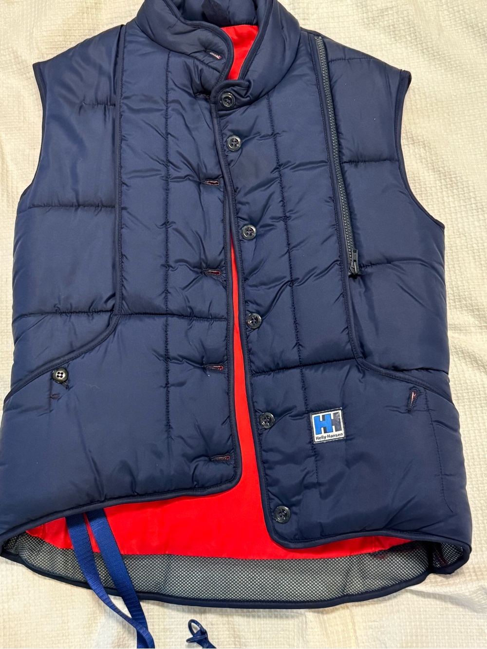 Helly Hansen Navy Vest with Red Trim and Blue Logo Patch